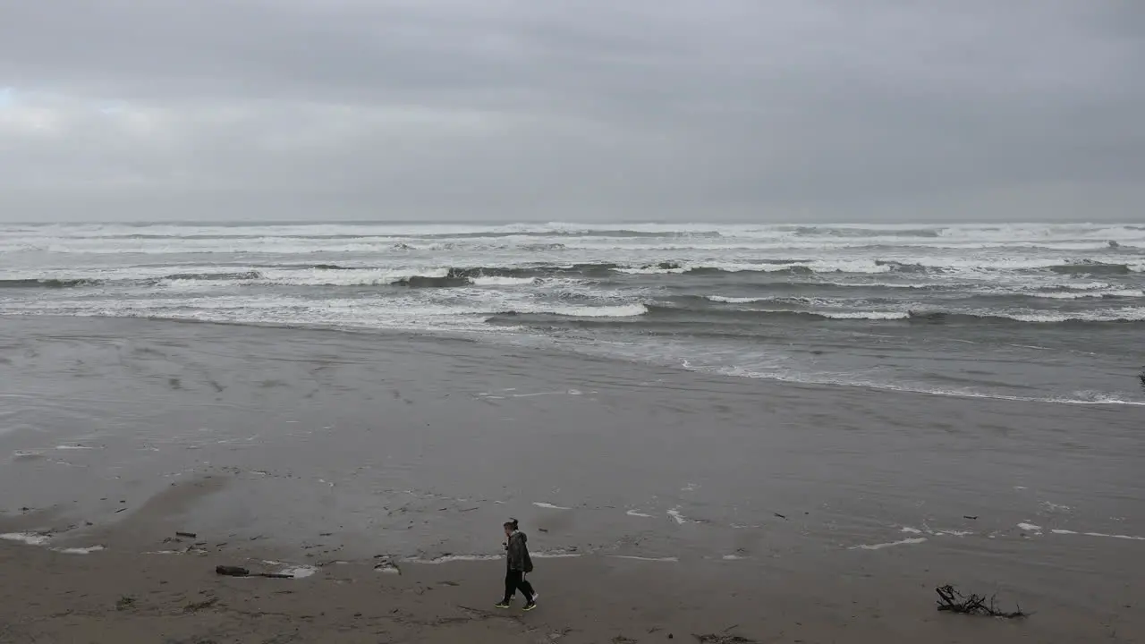 Oregon Couple Walking On Beach Pan