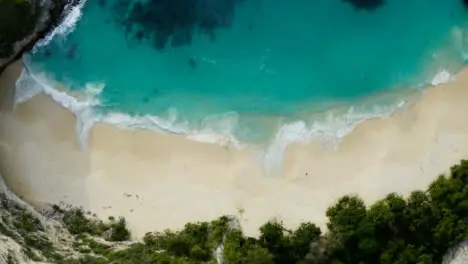 Drone Shot Ascending Above Tropical Island Beach 