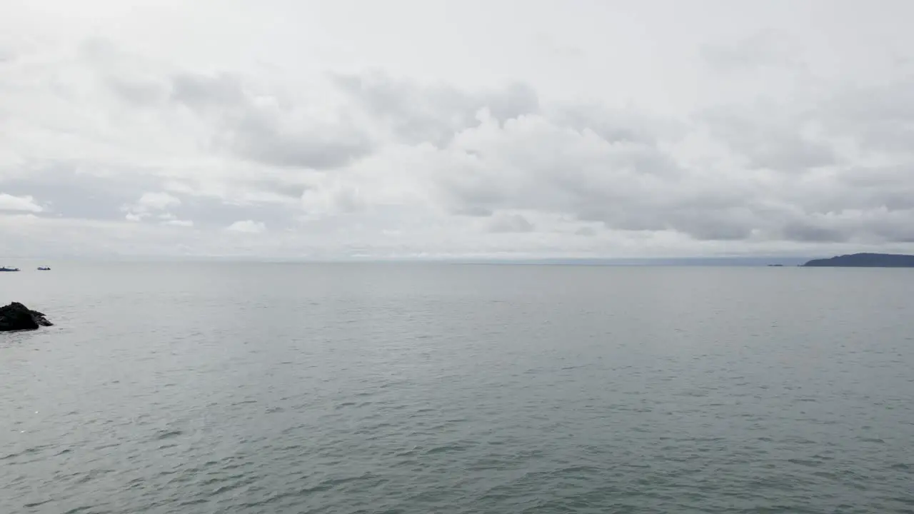 Stormy clouds above tropical beach and pacific ocean in Costa Rica