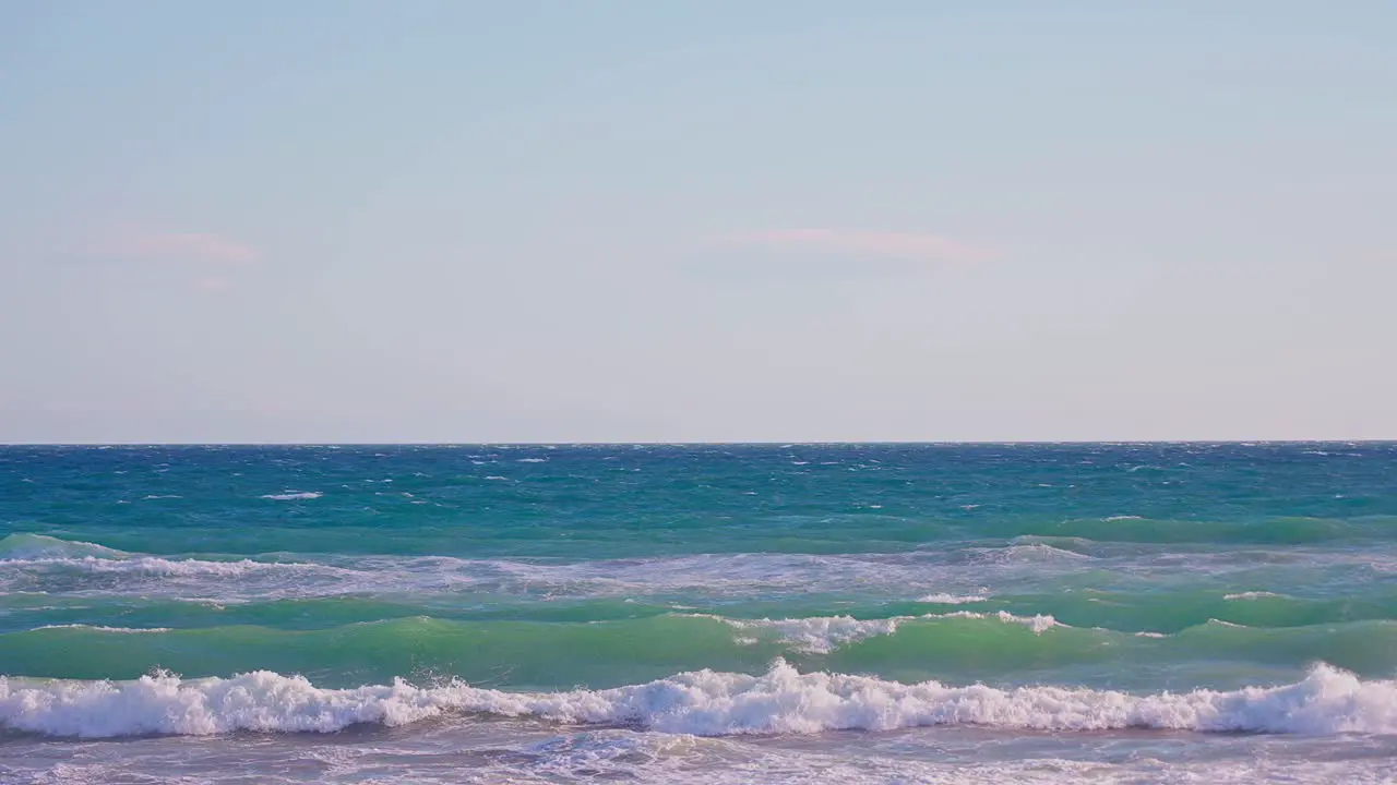 Ocean waves in slow motion at a windy day