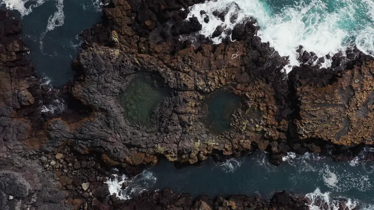 Icelandic tide pools on rocky shore of Snæfellsnes peninsula with waves