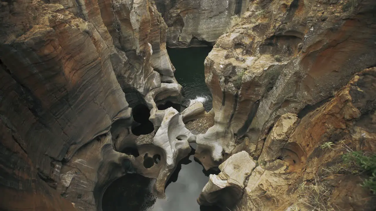 Rock formations from flowing water at a quarry in South Africa 4k