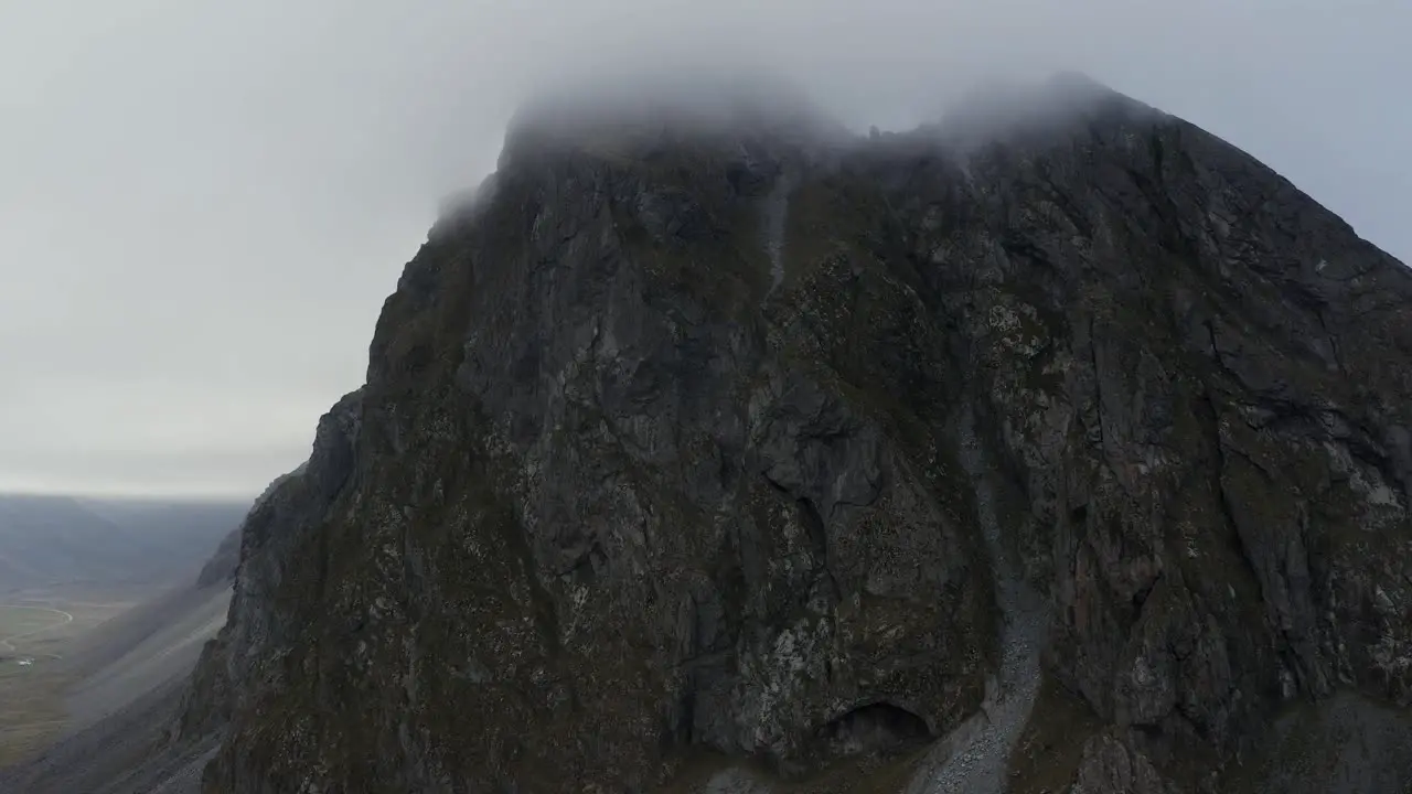 Dark colored granophyre mountain side of Eystrahorn range in Iceland aerial