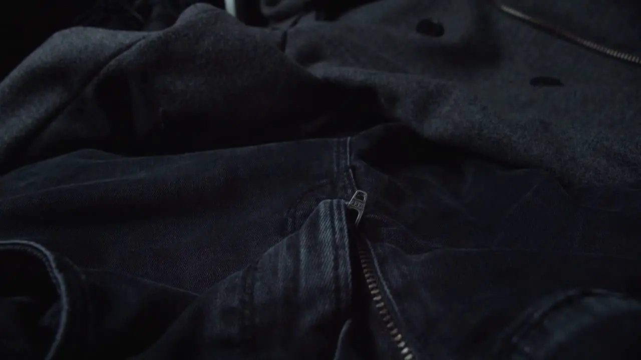 Close Up View Of Black Denim Pants