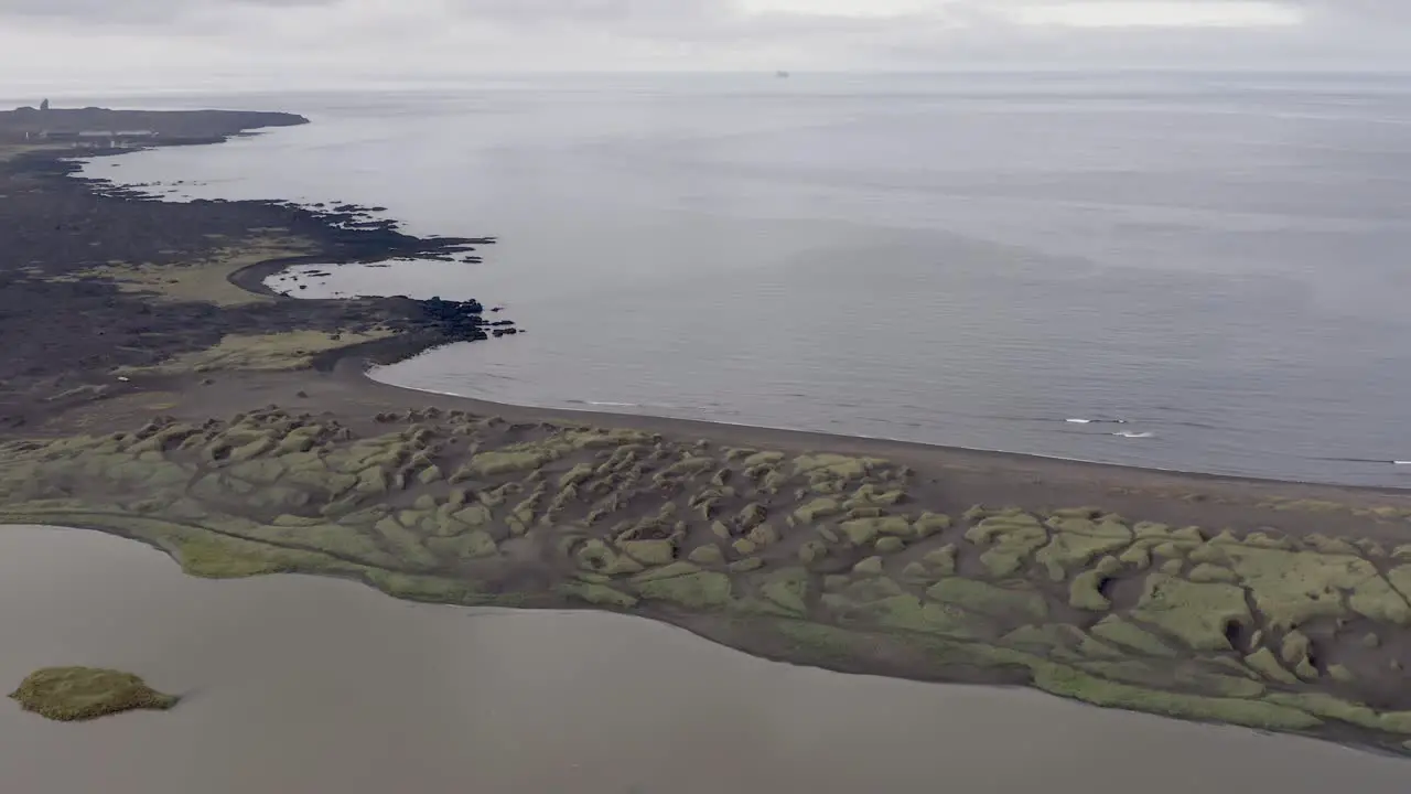 Stunning aerial view of coastal area shaped by erosion from elements in Iceland