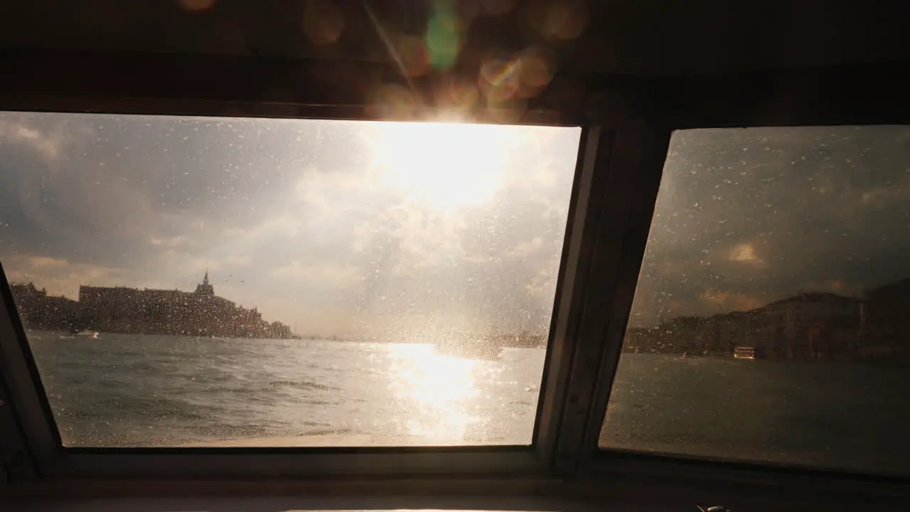 Venice Through Boat Window at Sunset