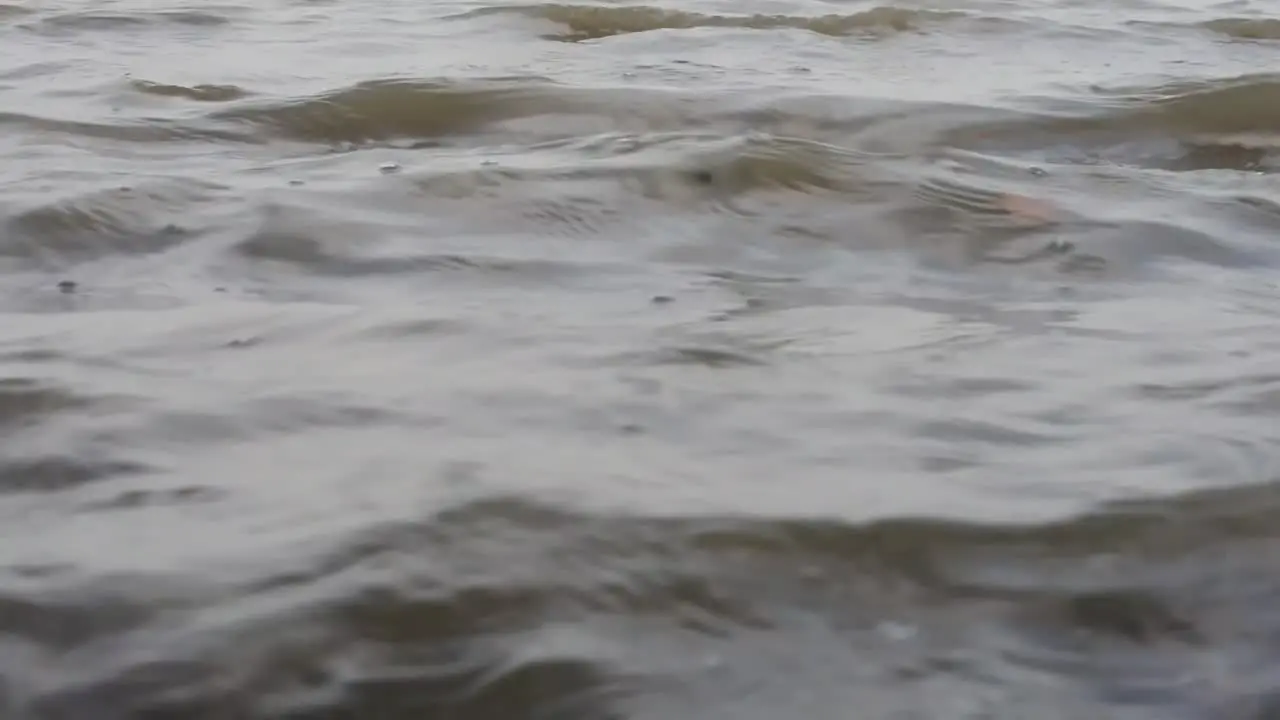 Low shot of waves on the beach