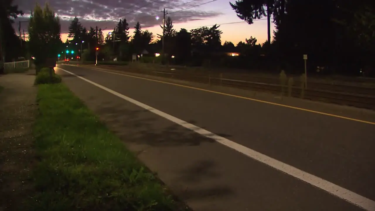 Cars driving at dusk in the city