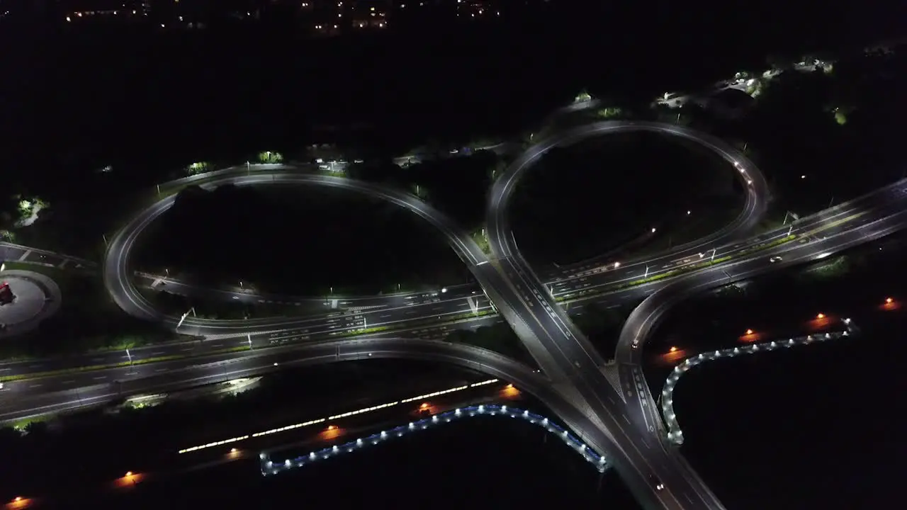 Drone shop over a heart shaped bridge in Taiwan with train passing through