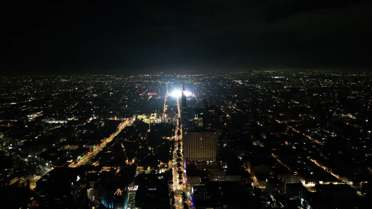 drone shot of madero avenue and zocalo ilumninated for independence day celebration at mexico city