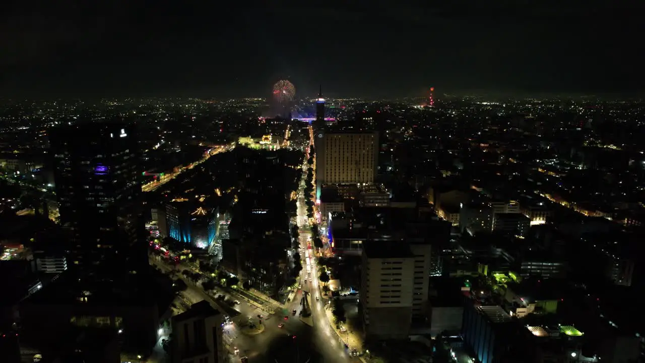 drone shot of fireworks demonstration at mexico city zocalo during independence day celebration at night