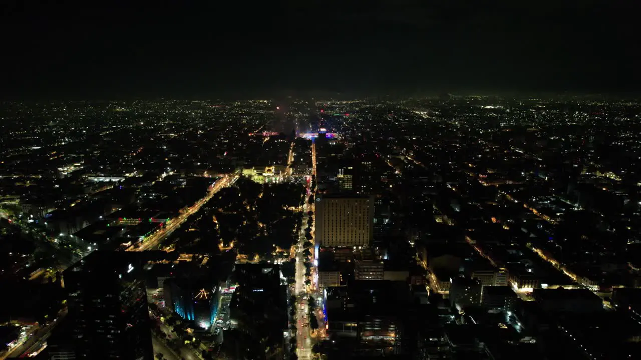 drone shot of fireworks demonstration at mexico city zocalo and juarez avenue during independence day celebration