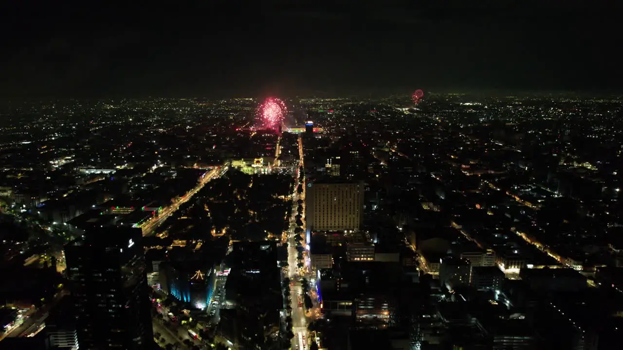 drone shot of fireworks demonstration at mexico city zocalo during independence day celebration