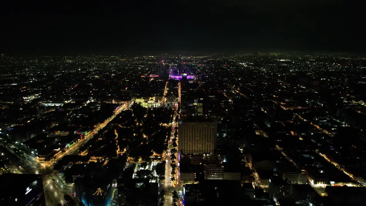 drone shot of diverse color fireworks demonstration at mexico city zocalo and alameda central