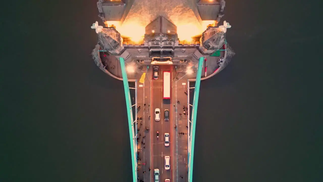 Dolly in Top-down shot of the Tower Bridge in London at night