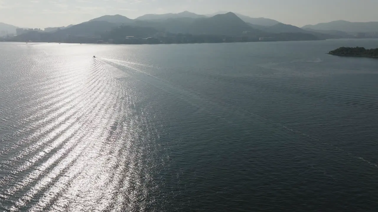 Aerial shot of tourism Boat on the water in the city in Hong Kong China