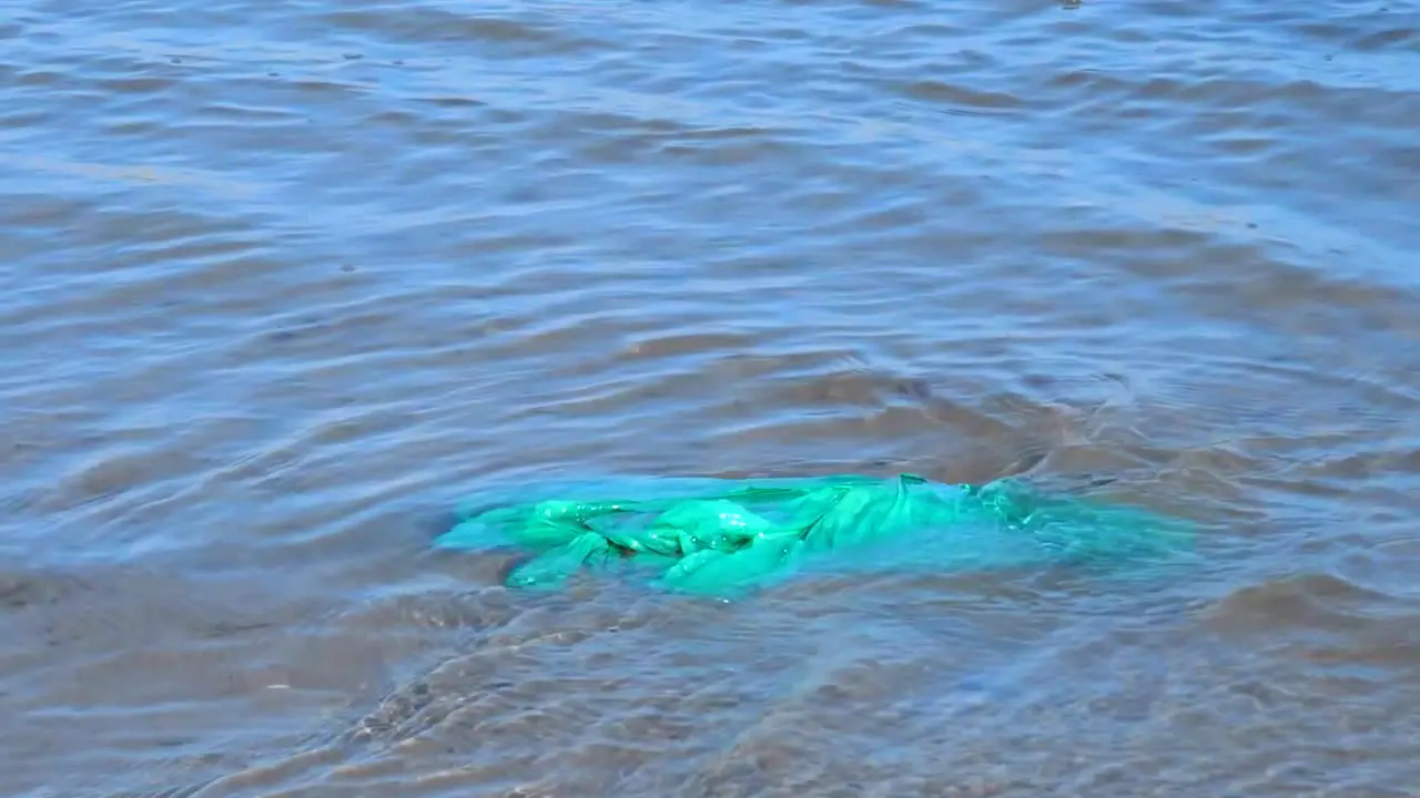 a Plastic bag floating in a water system