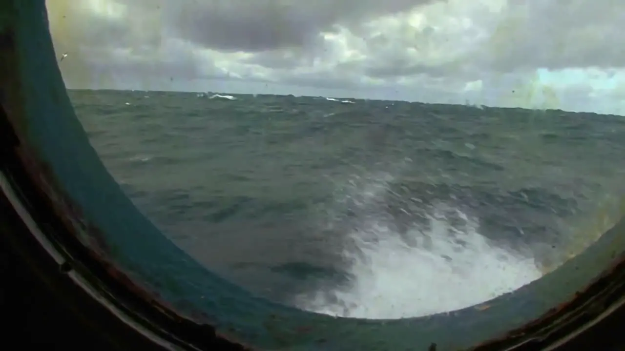 A view through a ship's porthole on the high seas