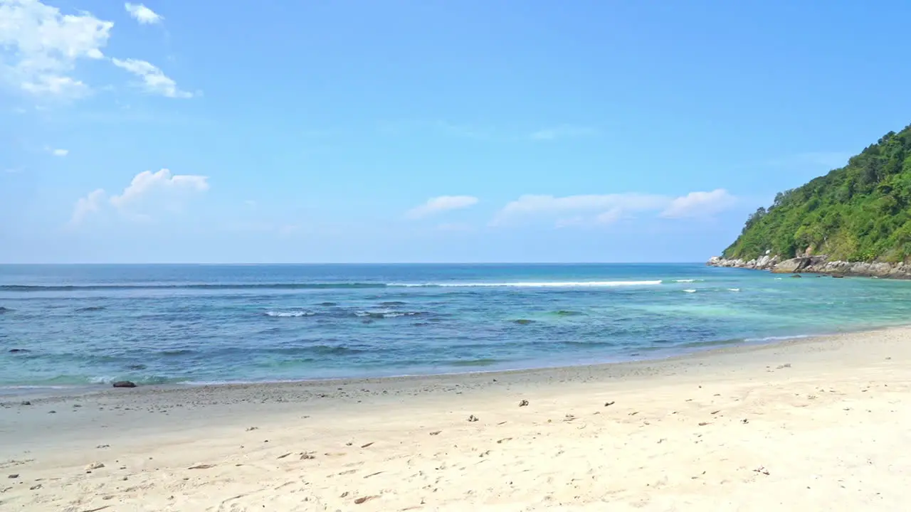 Beautiful deserted bay sea waves hitting shoreline Slow-motion