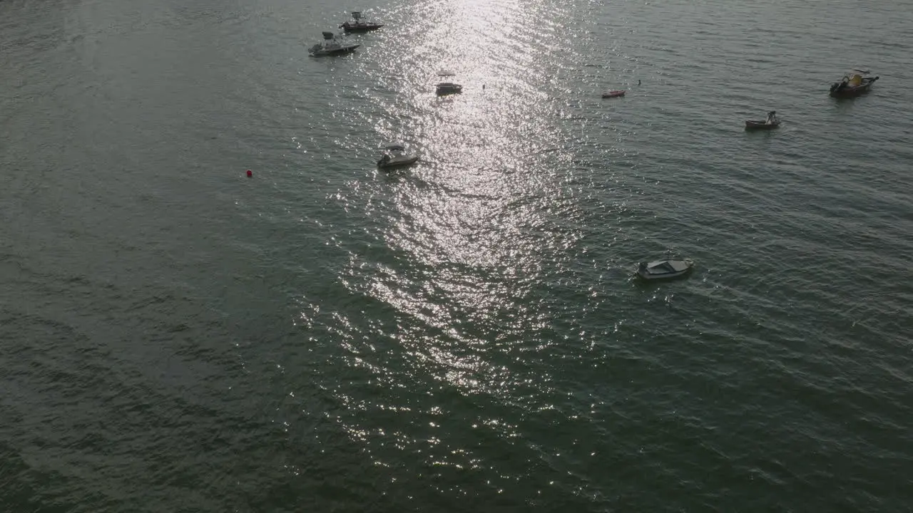 Aerial Drone shot of sailing tourism boats in Hong Kong waters China