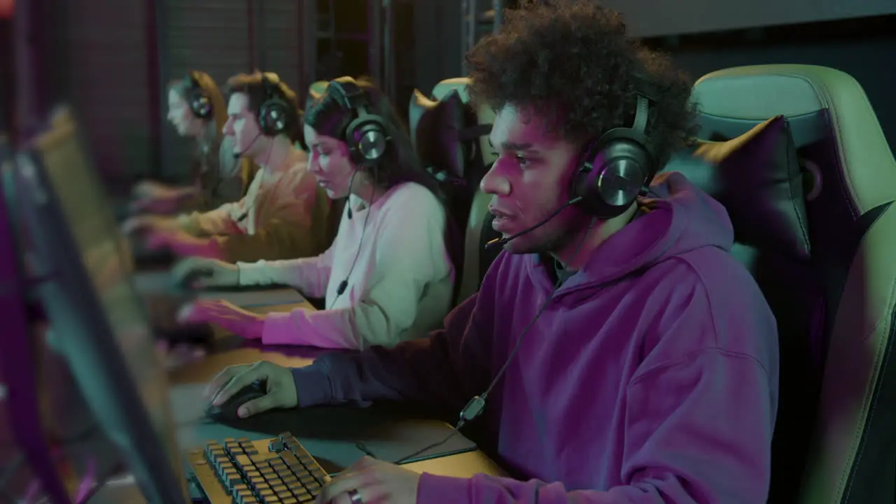 Cybersport Gamer Playing Video Games In A Gaming Club