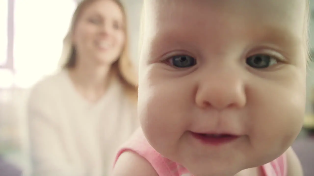 Adorable baby face looking in camera Portrait of happy child exploring world