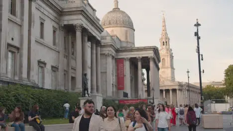 Trafalgar Square With National Gallery And St Martin In The Fields Church With Tourists In London England UK