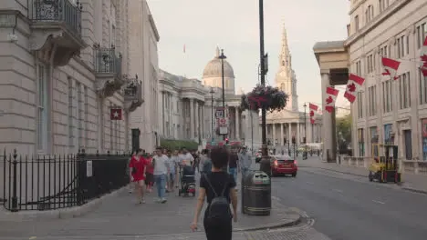 Trafalgar Square With National Gallery St Martin In The Fields Church And Canadian Embassy With Tourists In London England UK