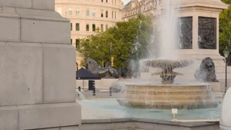 Trafalgar Square With Fountains At Base of Nelsons Column In London England UK