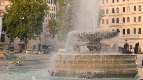 Trafalgar Square With Fountains At Base of Nelsons Column In London England UK 1