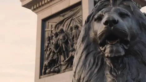 Trafalgar Square With Lion Sculptures At Base of Nelsons Column In London England UK