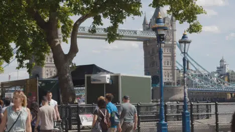 Crowd Of Summer Tourists Walking By Tower Bridge London England UK 4