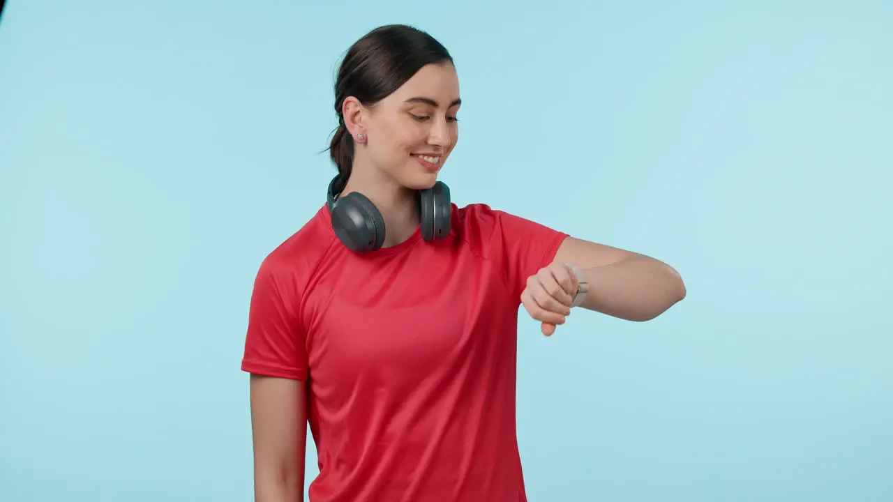 Smile watch and a fitness woman with headphones