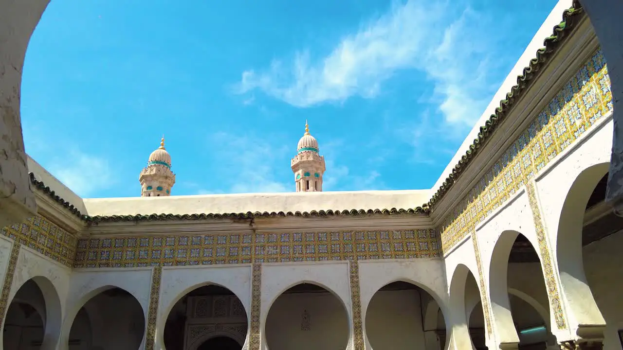 upper floor of the dar aziza with the minarets of the mosque in the background