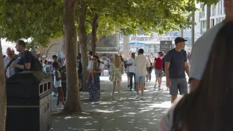 Crowd Of Summer Tourists Walking By The Tower Of London England UK 1