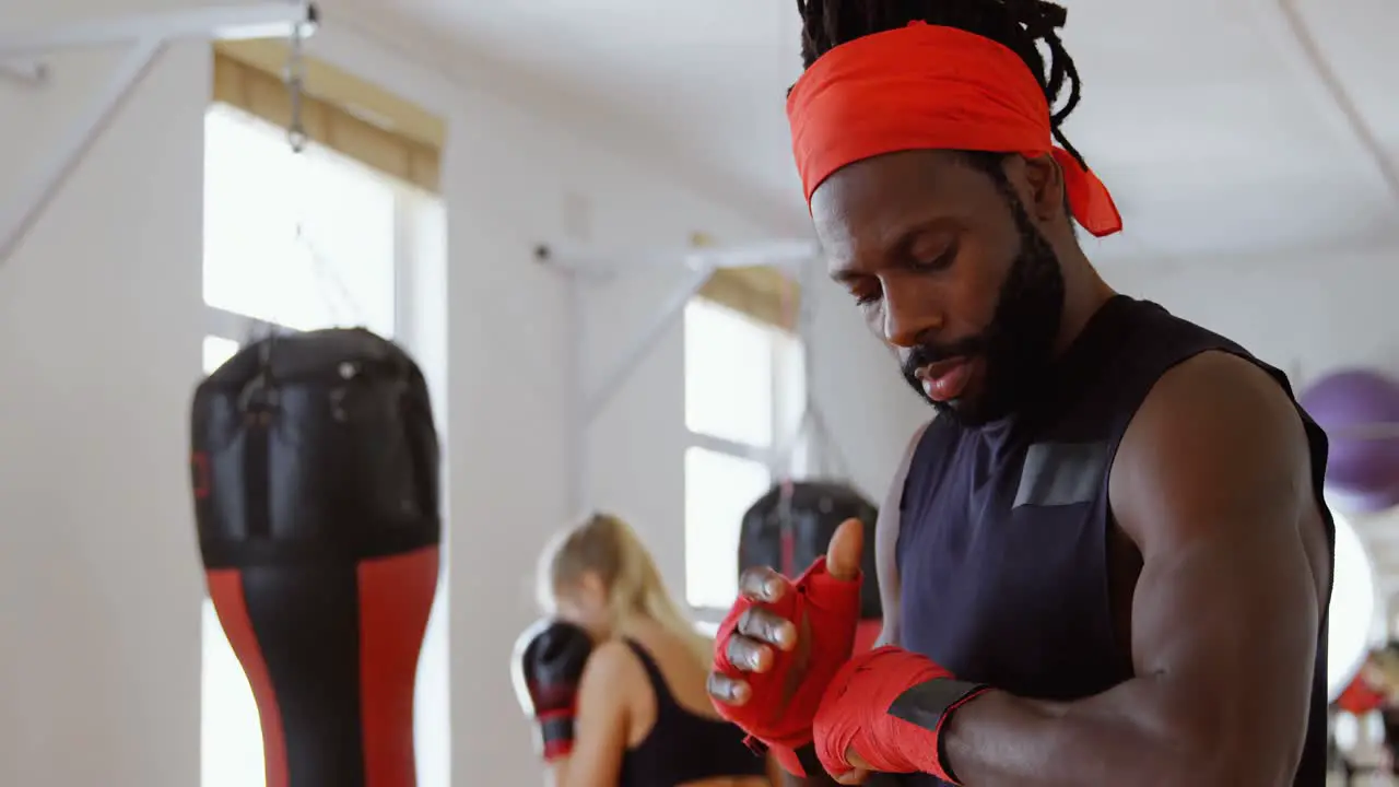 Male boxer warm-up in fitness studio 4k