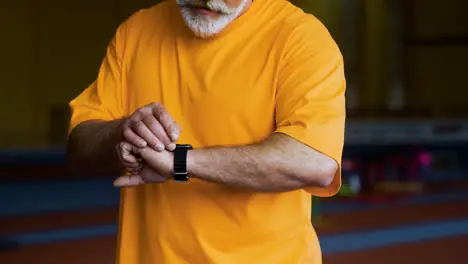 Senior man with fitness watch