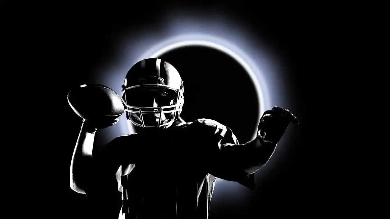 Animation of silhouette of male rugby player throwing a ball over glowing ring on black background