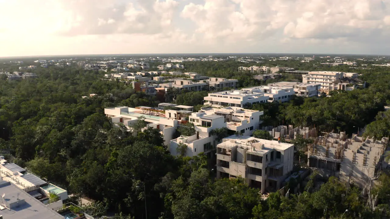 Apartment houses in suburban city area with dense foliage Mexico