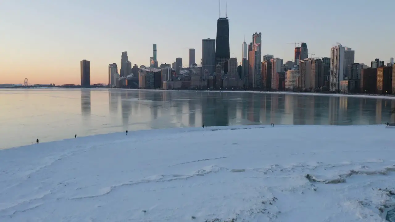 Chicago in Winter Drone Flying Above Huge Ice Chunks on Lake Michigan Reveals Chicago City Skyline