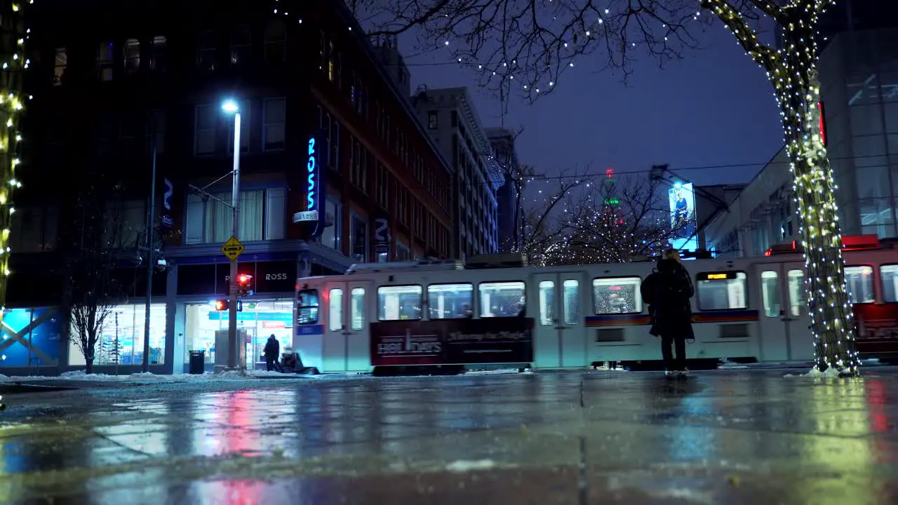 Light rail going through Denver downtown at night