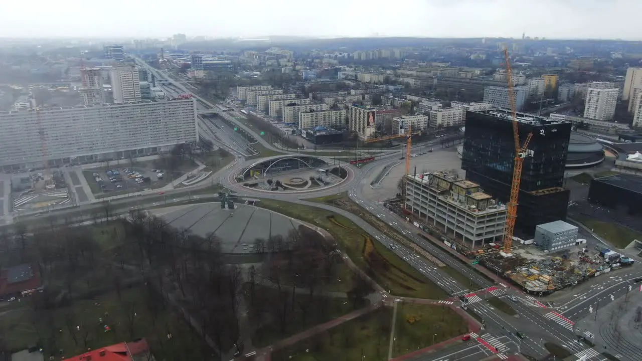 Aerial Over Big City With Building in Construction And Empty Roads