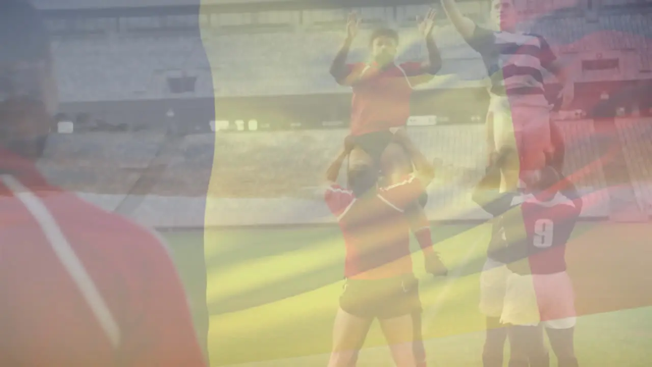 Animation of waving belgium over team of diverse male rugby players playing rugby at sporst field