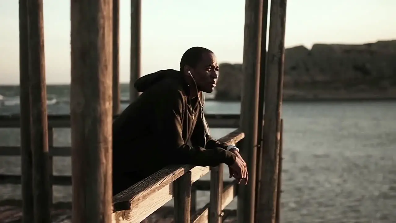 Man enjoying the view while standing on the promenade