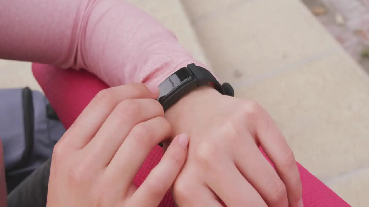 Caucasian woman with her watch