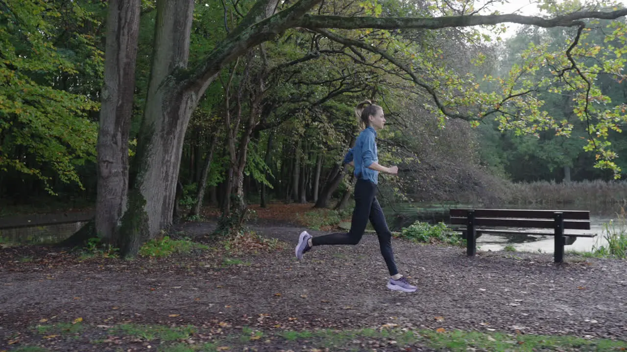 Captivating slow-motion shot camera follows woman from the side showcasing graceful movement