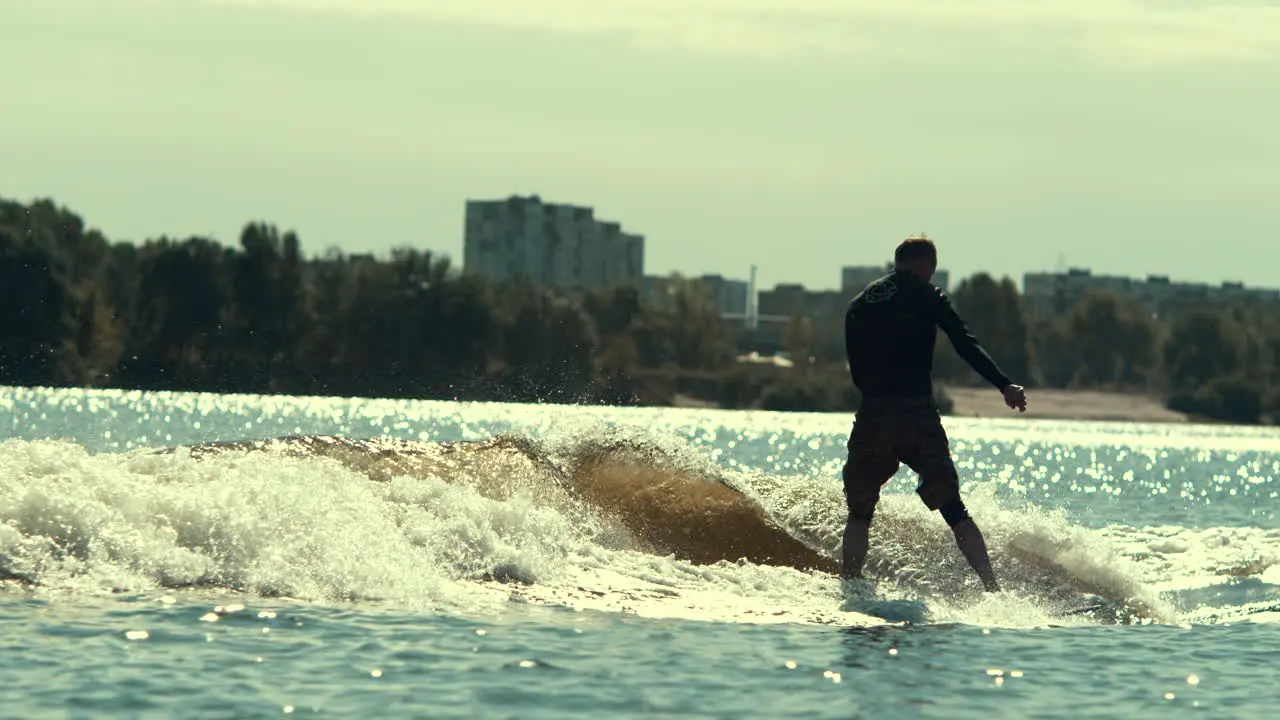 Man practicing water boarding