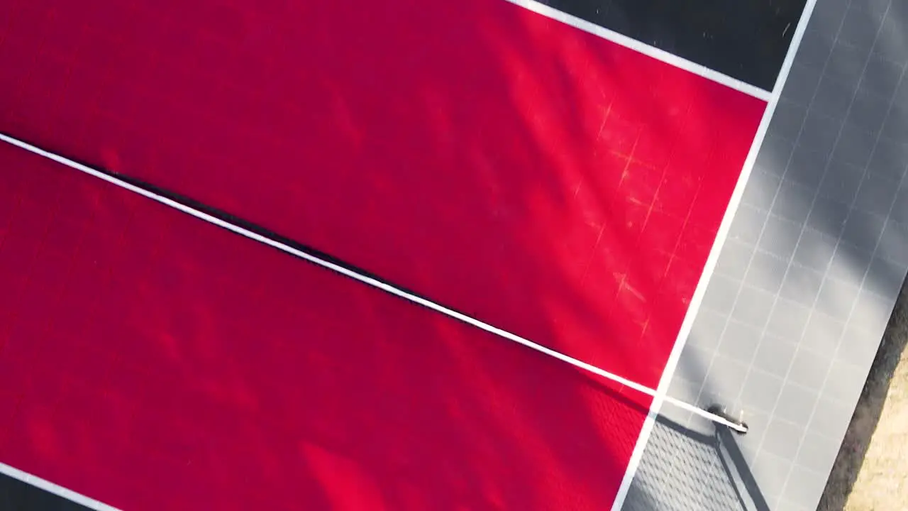 People Playing Pickleball on Outdoor Sport Court Aerial Conceptual View