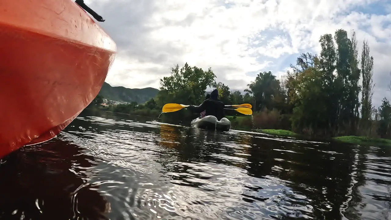 Kayaking water sport and friends on a boat