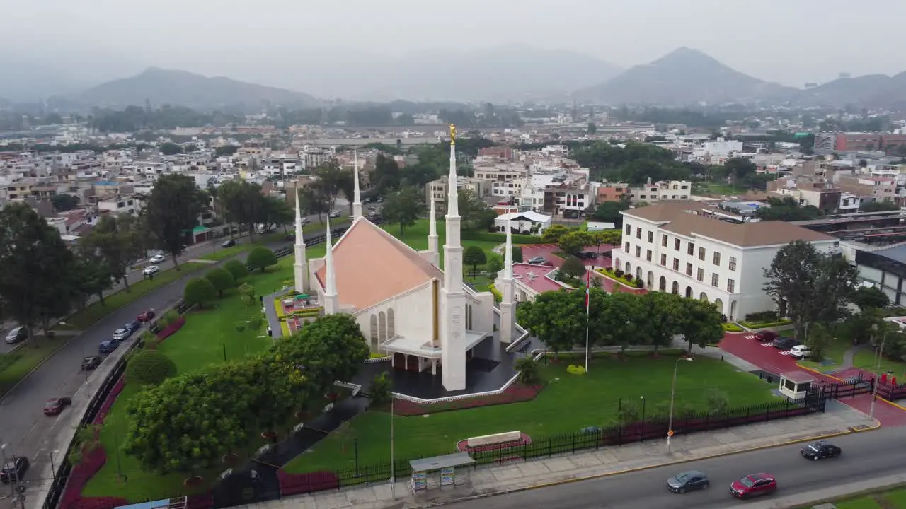 Drone orbits while increasing altitude around a mormon church